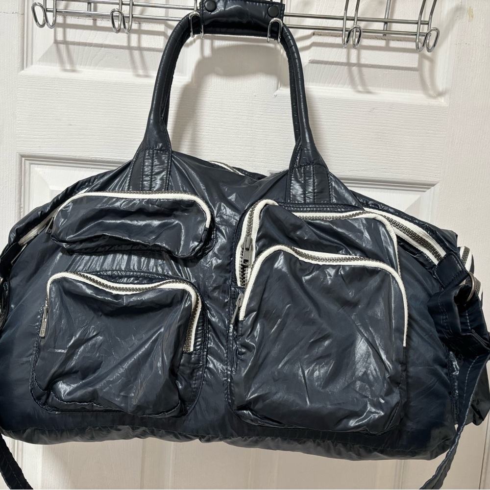 navy blue.  Nylon Duffel Bag with Multiple Pockets